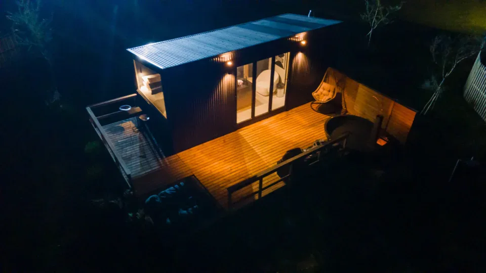Cabins glowing at night from above, Old Mac Daddy, Elgin Valley