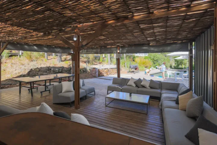 Thatched lapa deck, sofas, looking out, Old Mac Daddy, Elgin Valley