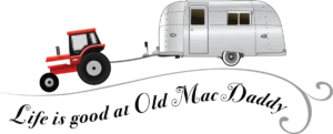 Home Old Mac Daddy logo: a tractor towing an Airstream, Life is good at Old Mac Daddy