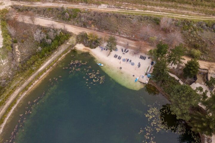Aerial view looking down on the lake and the sandy beach, Old Mac Daddy, Elgin Valley