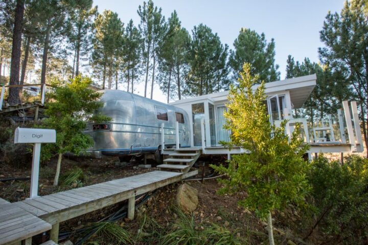 Dig'It: the Airstream and its glass-walled deck, with the name mailbox by the boardwalk, Old Mac Daddy, Elgin Valley